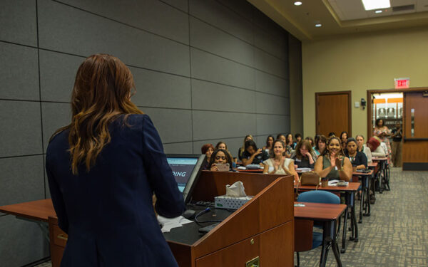 Anna-Vija McClain speaking to group of small business professionals