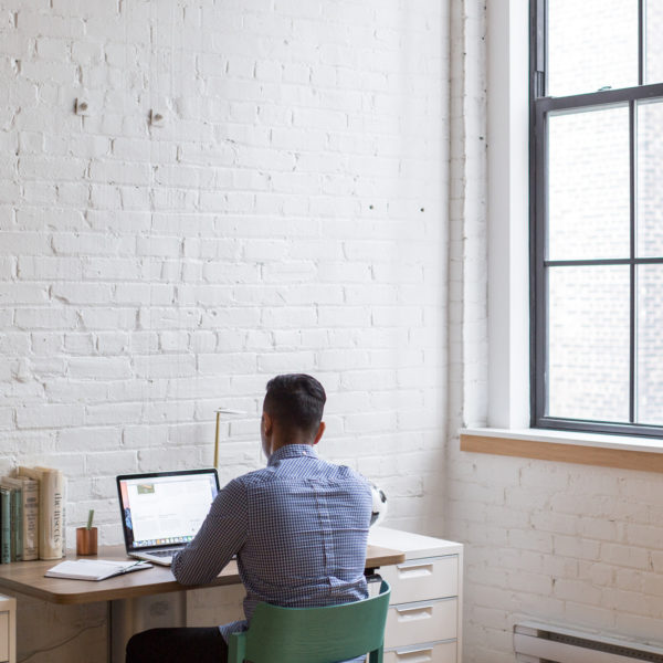 Man in his home starting a business