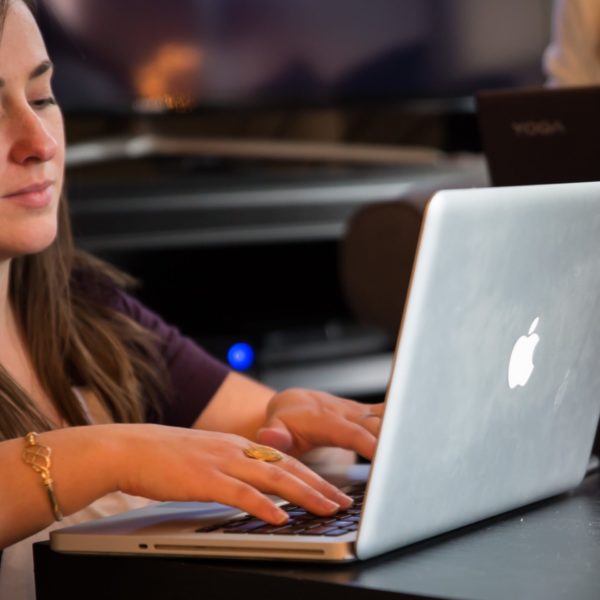 Remote worker doing work on laptop