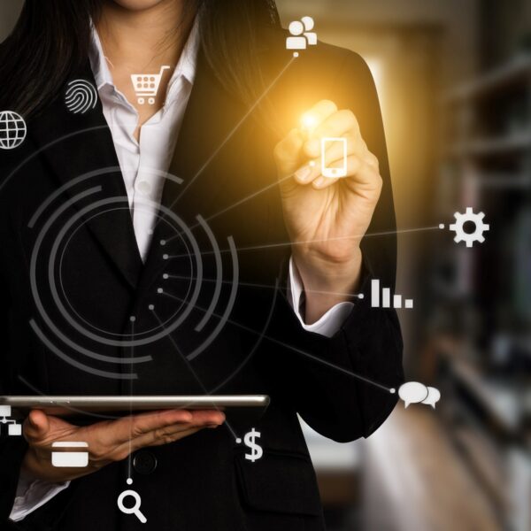 Business woman in suit using marketing trends